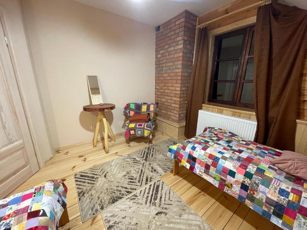 Postel nebo postele na pokoji v ubytování Marusia
