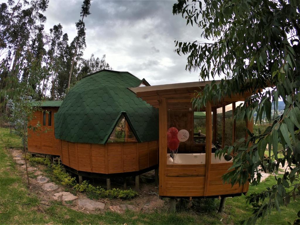 Taman di luar Libélula Glamping con jacuzzi