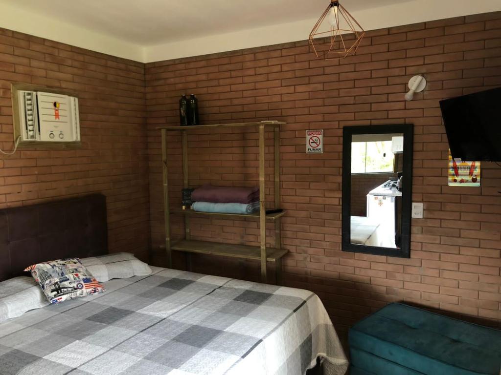 Postel nebo postele na pokoji v ubytování Moradas Brisa da Lagoa