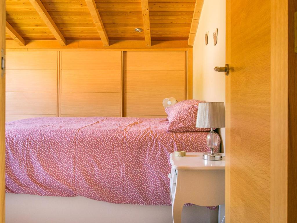 Кровать или кровати в номере Patos Beach II - Cies