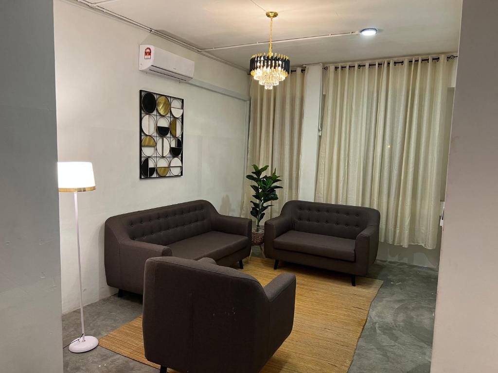 Posezení v ubytování Cassia Inn Kuching