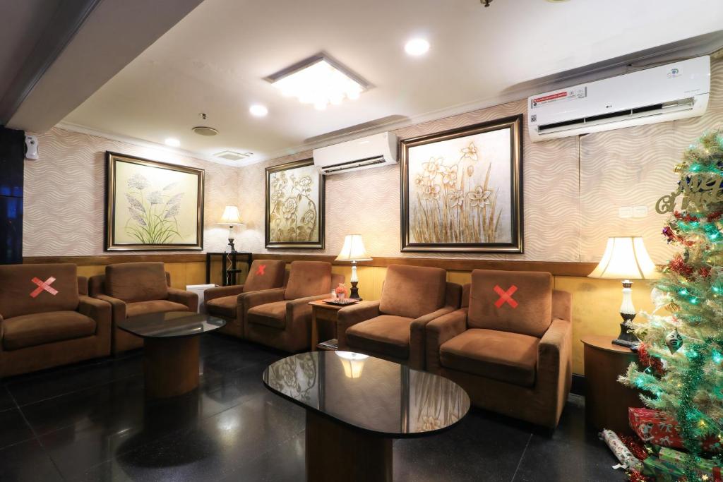 Posezení v ubytování Coins Hotel Jakarta