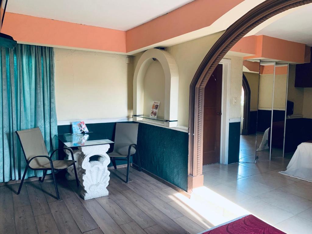 Postel nebo postele na pokoji v ubytování Hotel Rio Inn