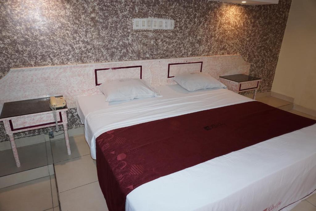 Postel nebo postele na pokoji v ubytování Hotel Rio Inn