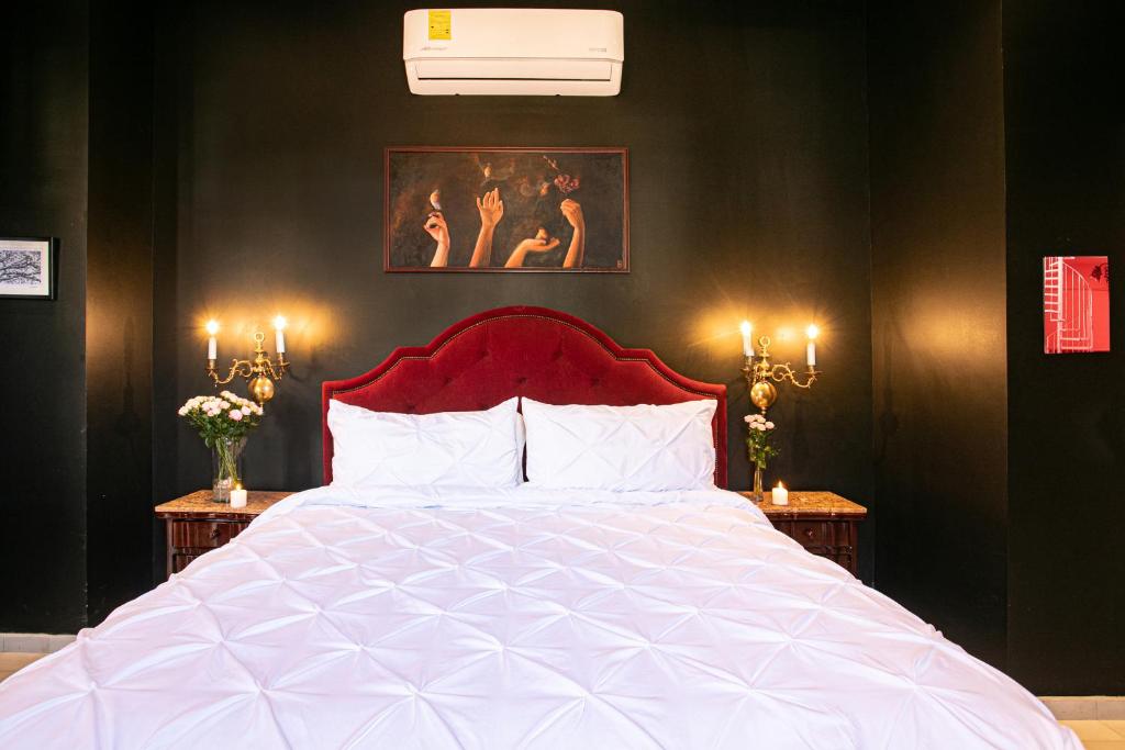 Postel nebo postele na pokoji v ubytování Hotel Boutique Rivera Del Rio