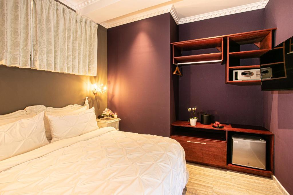 Postel nebo postele na pokoji v ubytování Hotel Boutique Rivera Del Rio