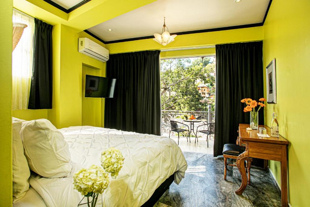TV a/nebo společenská místnost v ubytování Hotel Boutique Rivera Del Rio