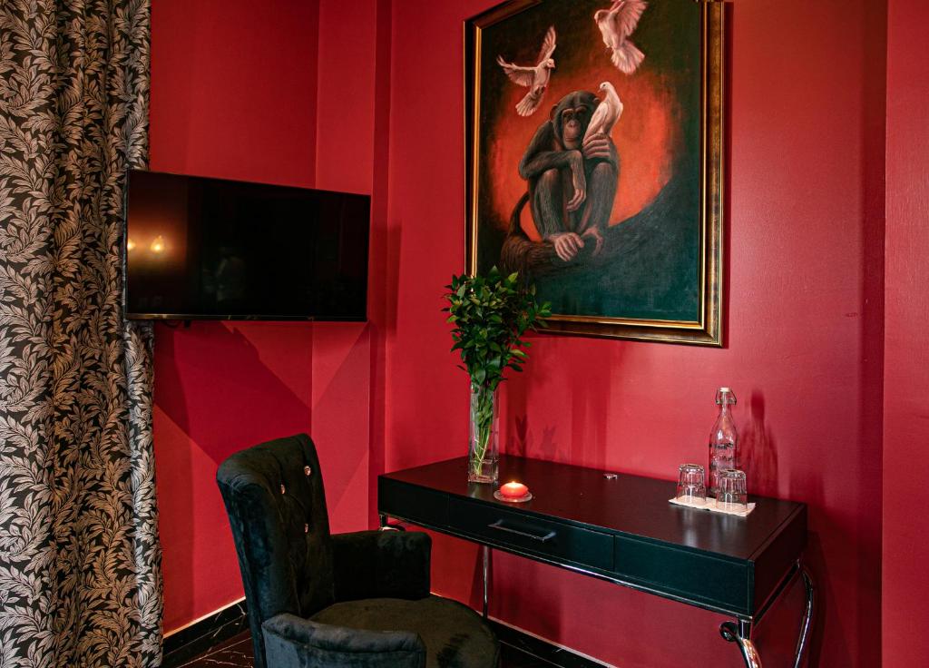 TV a/nebo společenská místnost v ubytování Hotel Boutique Rivera Del Rio