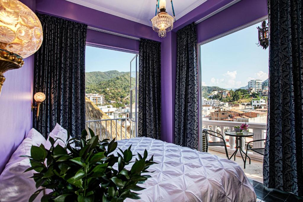 Postel nebo postele na pokoji v ubytování Hotel Boutique Rivera Del Rio