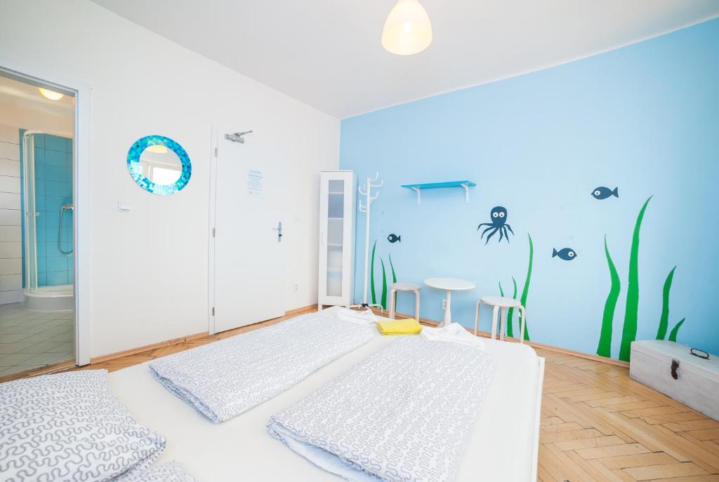 Postel nebo postele na pokoji v ubytování Patio Hostel