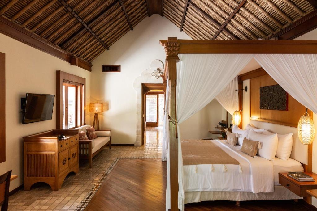 Ліжко або ліжка в номері Melia Bali