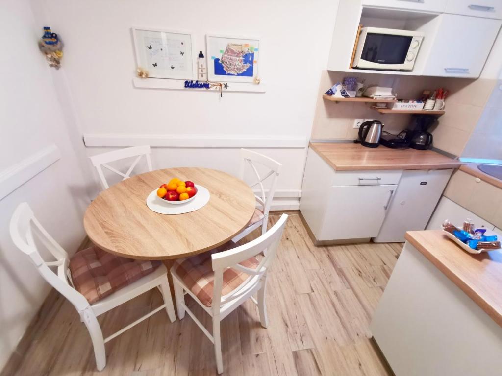 Kuchyň nebo kuchyňský kout v ubytování Old Town Apartment Theo