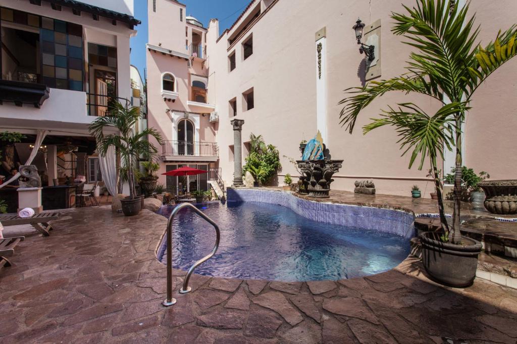 Bazén v ubytování Garlands Del Rio Riverside Boutique Hotel nebo v jeho okolí