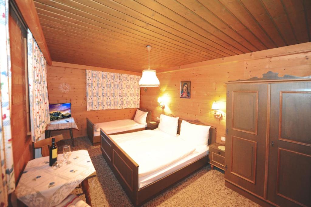 Postel nebo postele na pokoji v ubytování Riederhof