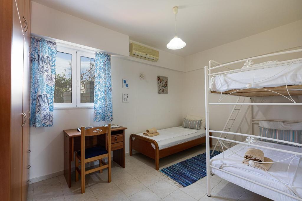 Posteľ alebo postele v izbe v ubytovaní Pigi Paradise Residence