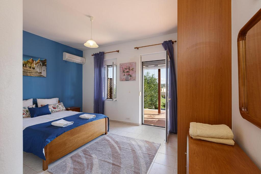 Posteľ alebo postele v izbe v ubytovaní Pigi Paradise Residence