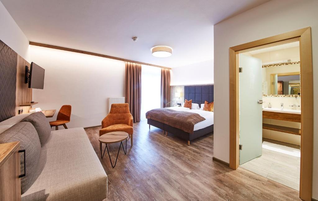 Postel nebo postele na pokoji v ubytování Hotel Römerhof