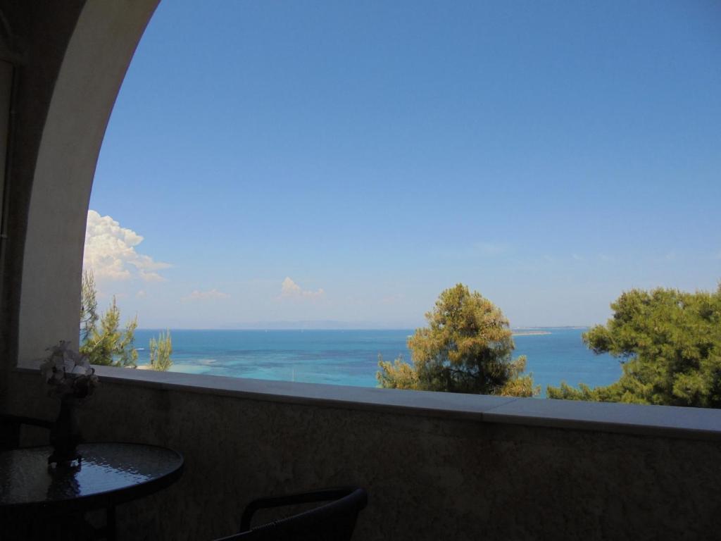 a view of the ocean from a balcony at Agistri Island Dream in Skala