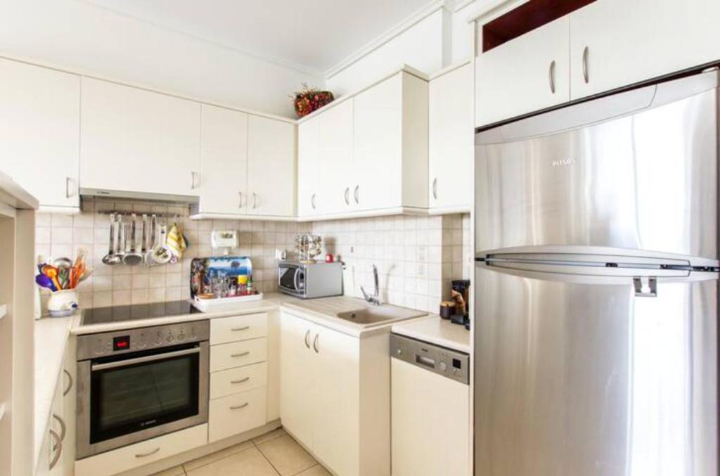 Kuchyň nebo kuchyňský kout v ubytování City apartment Mall center