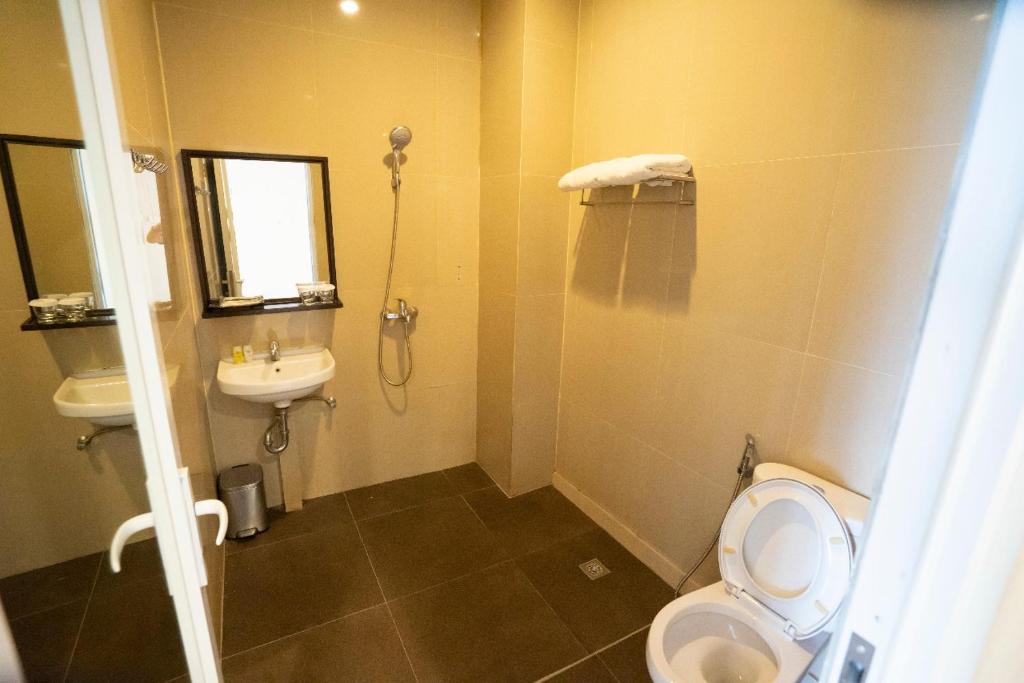 Koupelna v ubytování Bangka City Hotel