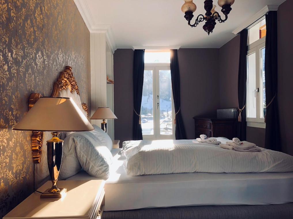 Postel nebo postele na pokoji v ubytování Historisches Hotel Bären