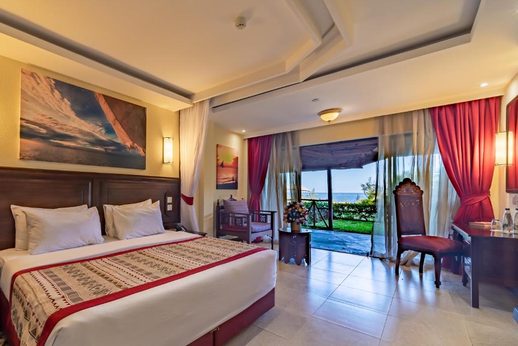 Postel nebo postele na pokoji v ubytování PrideInn Paradise Beach Resort & Spa Mombasa