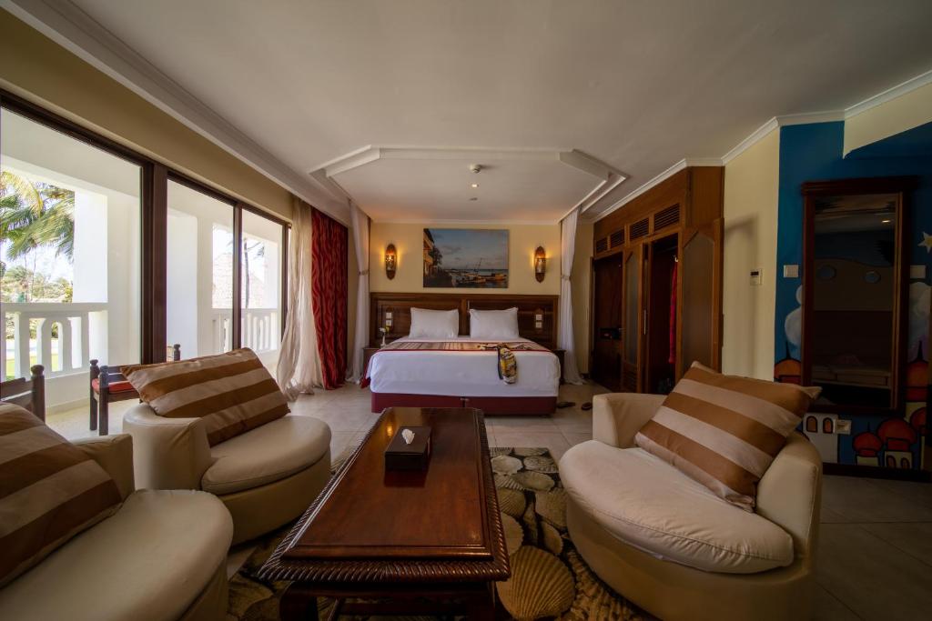 Postel nebo postele na pokoji v ubytování PrideInn Paradise Beach Resort & Spa Mombasa