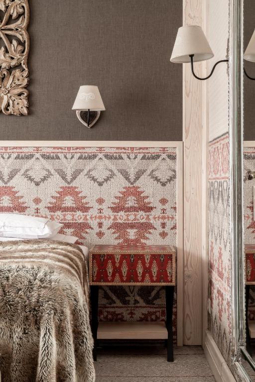 Postel nebo postele na pokoji v ubytování Aries Hotel & SPA Zakopane