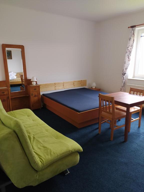Postel nebo postele na pokoji v ubytování penzion Poutník