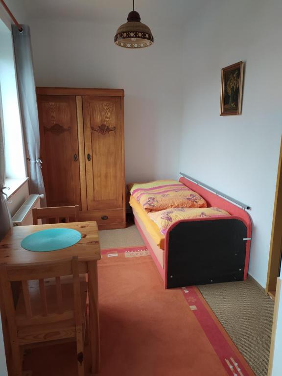 Postel nebo postele na pokoji v ubytování penzion Poutník