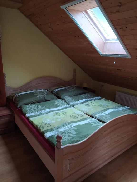 Postel nebo postele na pokoji v ubytování penzion Poutník