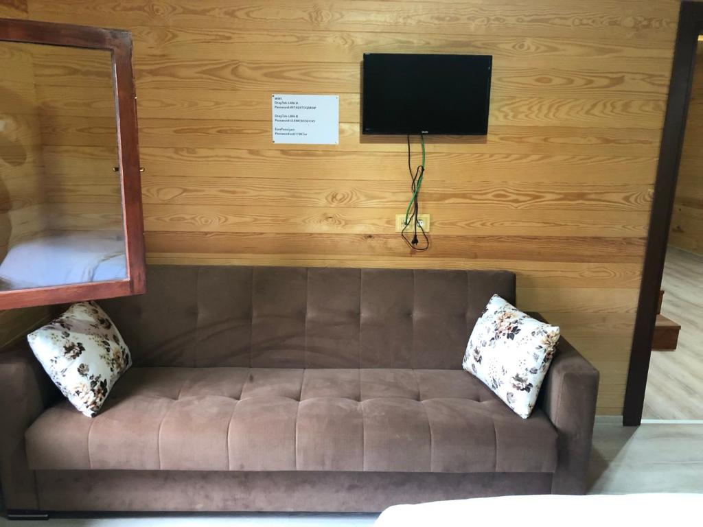 A television and/or entertainment centre at CERRAHPAŞA SUİTE HOTEL