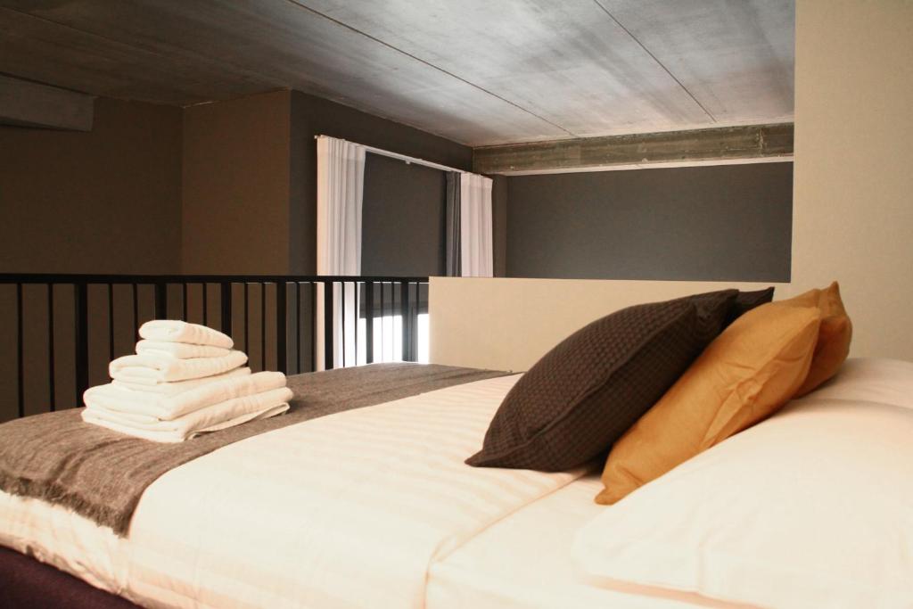 A bed or beds in a room at Dimore al Te