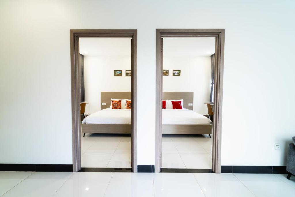 Postel nebo postele na pokoji v ubytování LH Residence 752