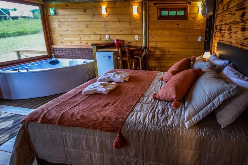 Postel nebo postele na pokoji v ubytování Refugio monte itapeva