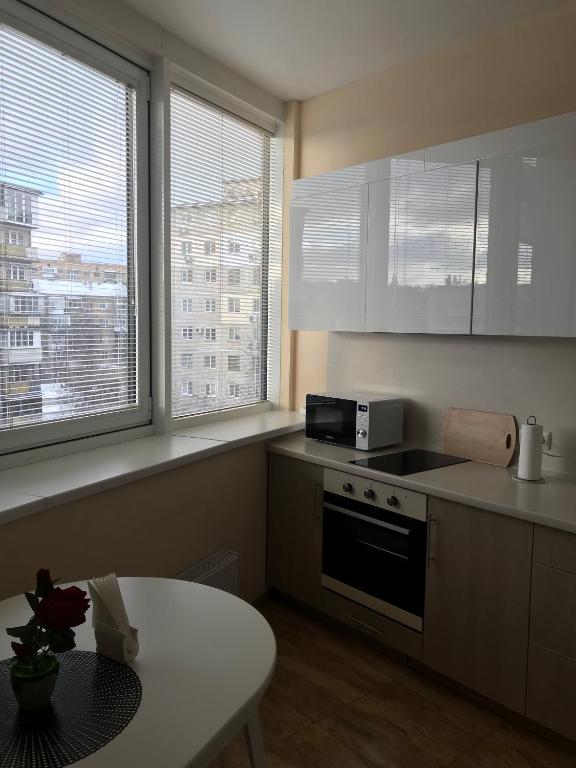 Kuchyň nebo kuchyňský kout v ubytování Apart Assistant on Smart Plaza