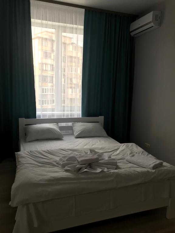 Postel nebo postele na pokoji v ubytování Apart Assistant on Smart Plaza