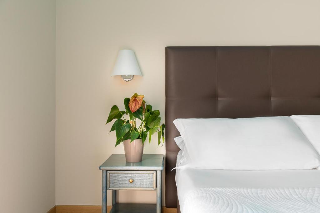 Postel nebo postele na pokoji v ubytování Hotel Adlon - FRONTE MARE