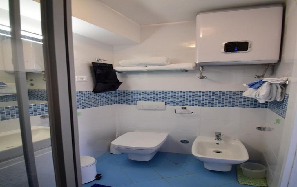 Kúpeľňa v ubytovaní Apartment Šulić