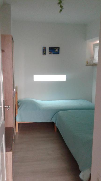 Posteľ alebo postele v izbe v ubytovaní Apartment Šulić