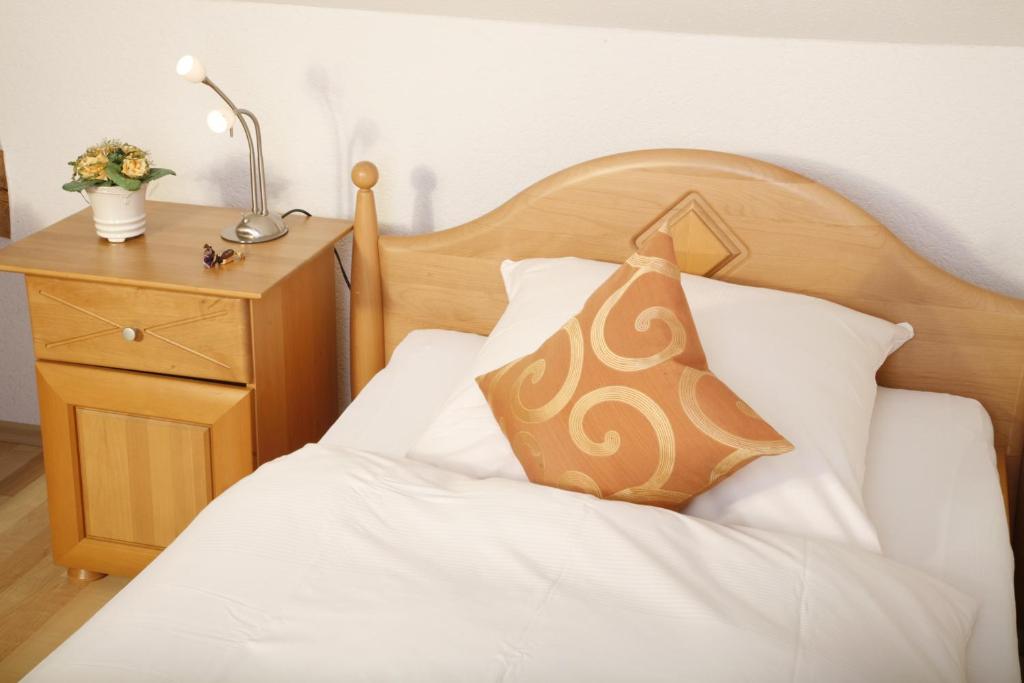 Postel nebo postele na pokoji v ubytování Rixbecker Alpen - Hotel Koch