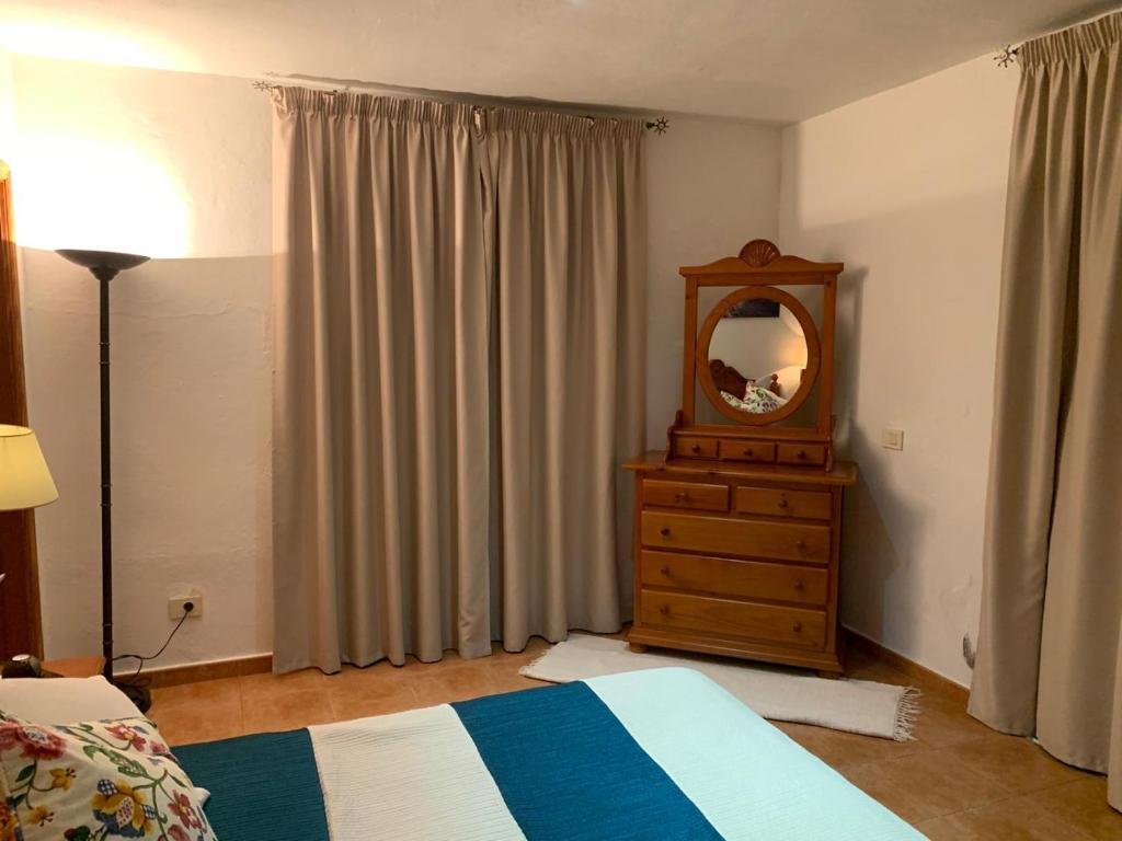 A bed or beds in a room at El Cercado