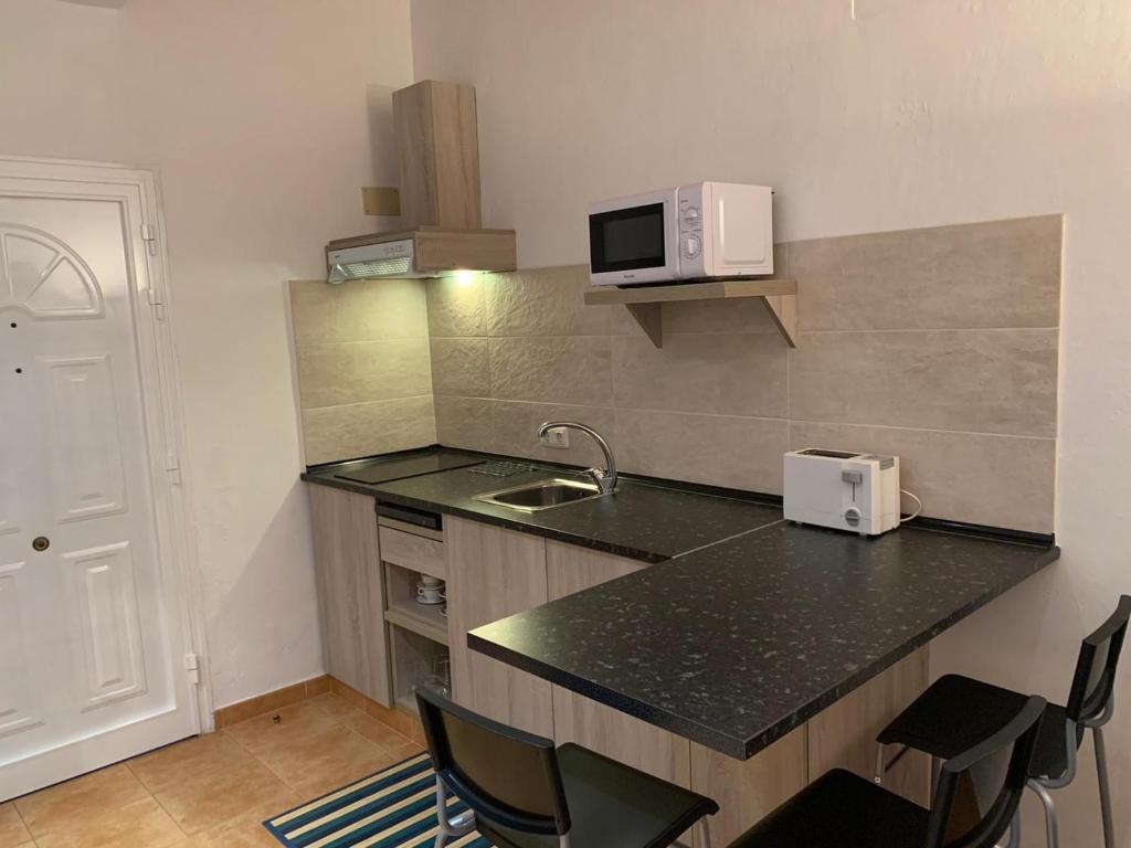 A kitchen or kitchenette at El Cercado