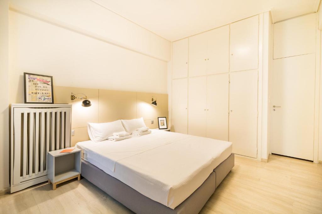 Posteľ alebo postele v izbe v ubytovaní One-Bedroom Apartment - Kolonaki