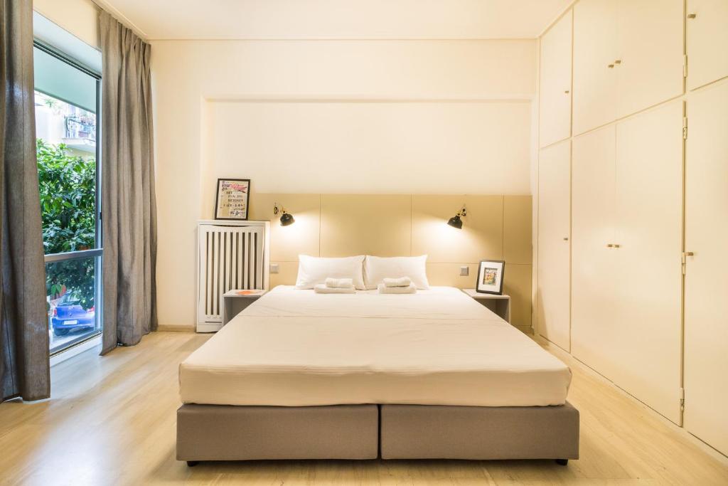 Posteľ alebo postele v izbe v ubytovaní One-Bedroom Apartment - Kolonaki