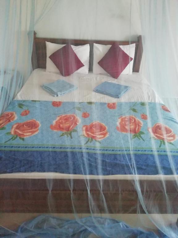 Postel nebo postele na pokoji v ubytování Dreamscape home stay