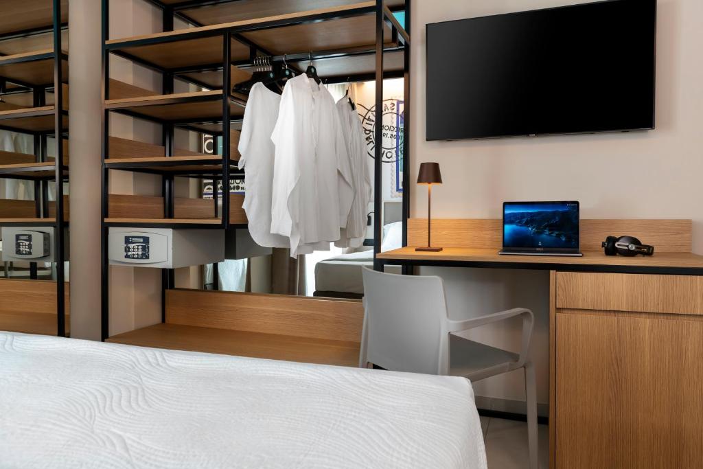 Postel nebo postele na pokoji v ubytování Hotel Adlon - FRONTE MARE