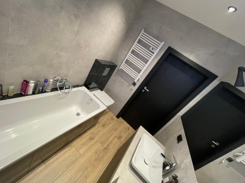 Kúpeľňa v ubytovaní Apartamenty Zielona 9