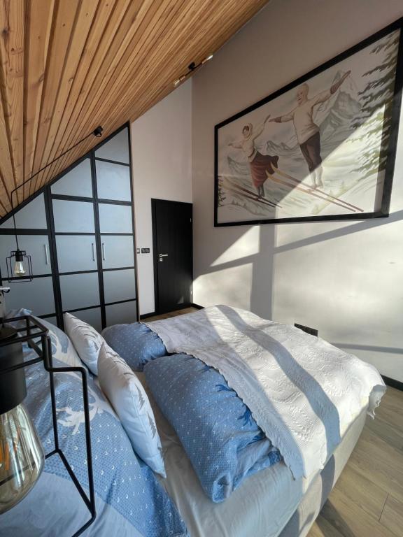 Posteľ alebo postele v izbe v ubytovaní Apartamenty Zielona 9