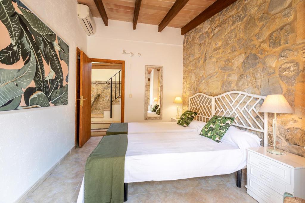 Posteľ alebo postele v izbe v ubytovaní Villa Costa Puerto Pollensa by JS Villas